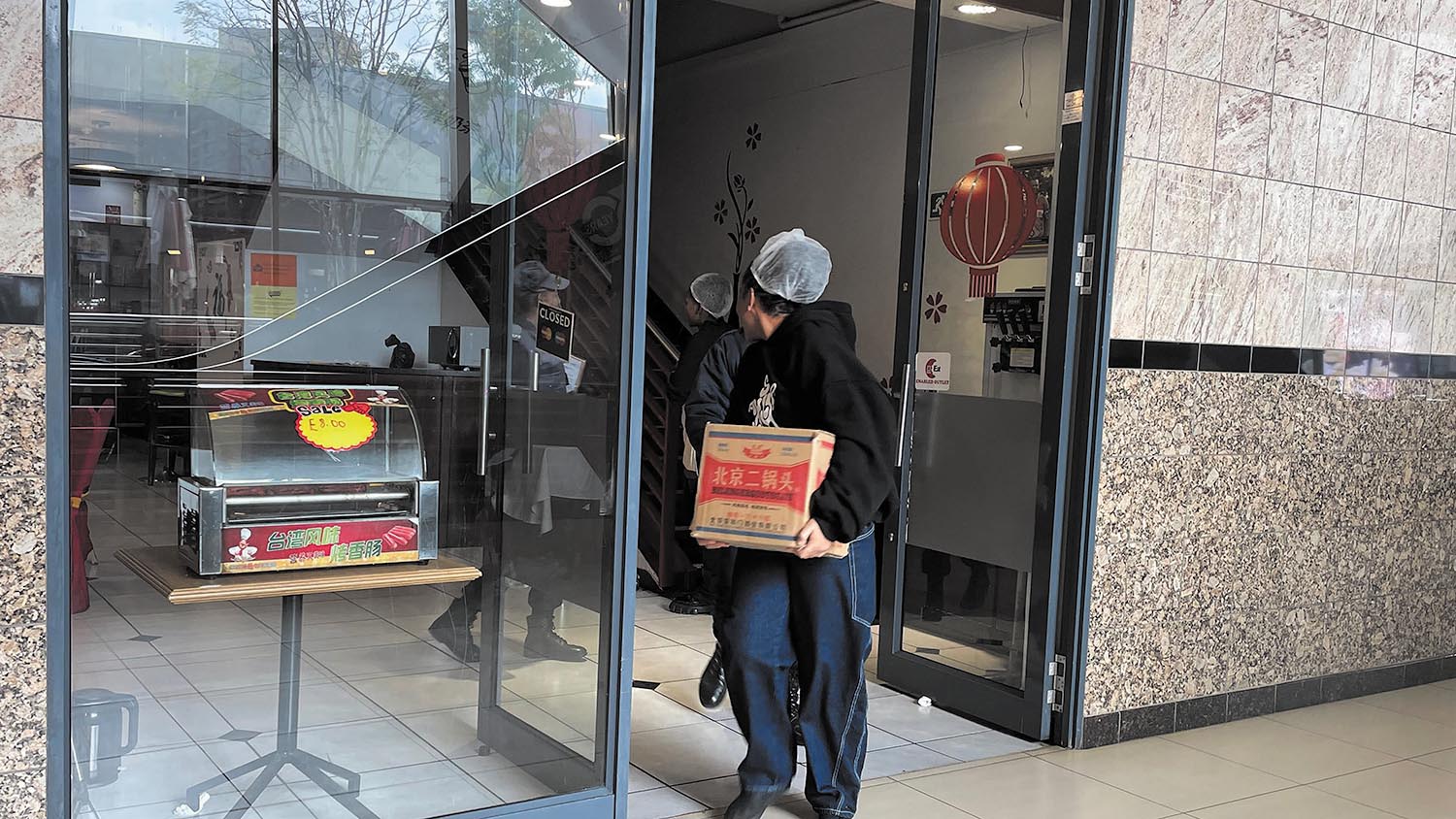 Police raid, close Chinese restaurant over mystery booze